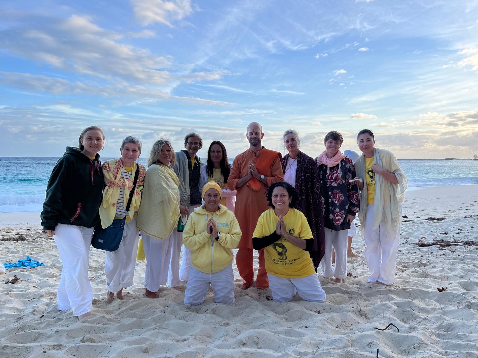 The MIP Sangha gathered with Swamiji on the beach