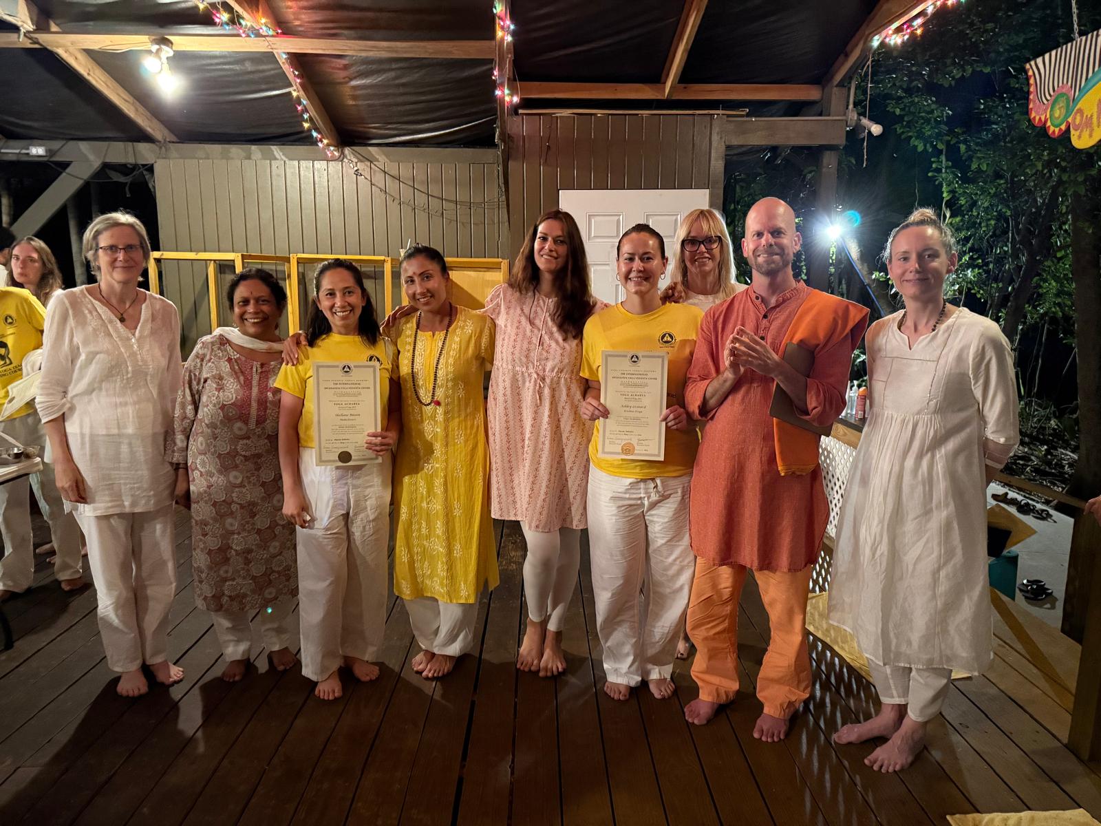 A MIP graduation group celebrating together with certificates